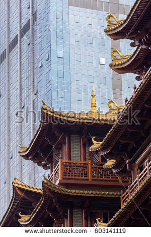 stock-photo-juxtaposition-of-old-versus-new-architecture-styles-modern-skyscraper-towering-above-a-traditional-603141119