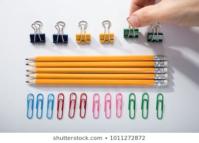 persons-finger-arranging-pencils-row-260nw-1011272872